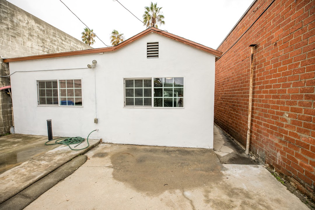 Rear exterior and brick-wall view in the Culver City backyard