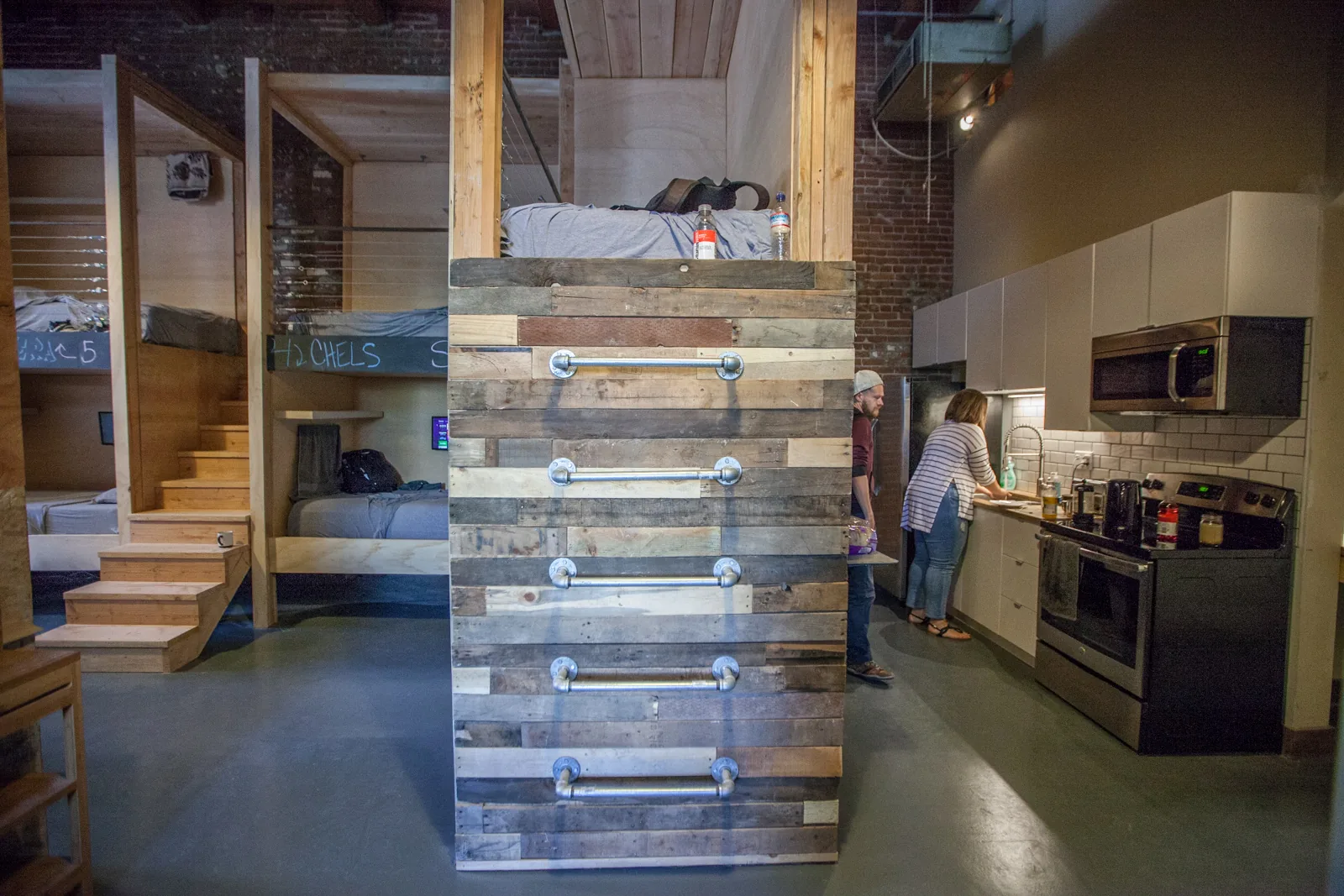 DTLA Arts District loft with exposed brick and long communal table