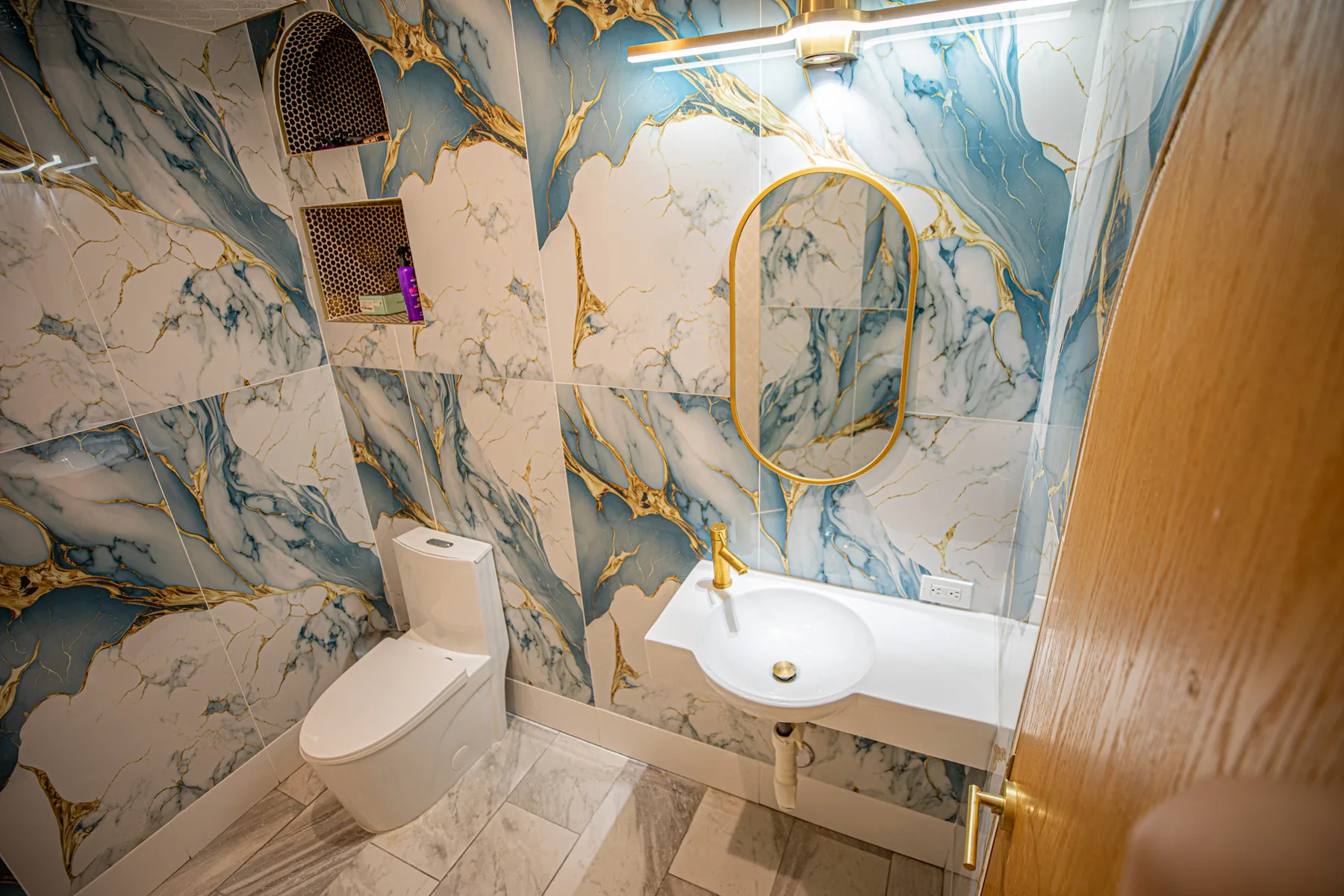 Floor-to-ceiling tiled bathroom
